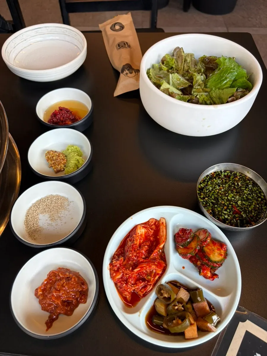 Side dishes set on the table before ordering
