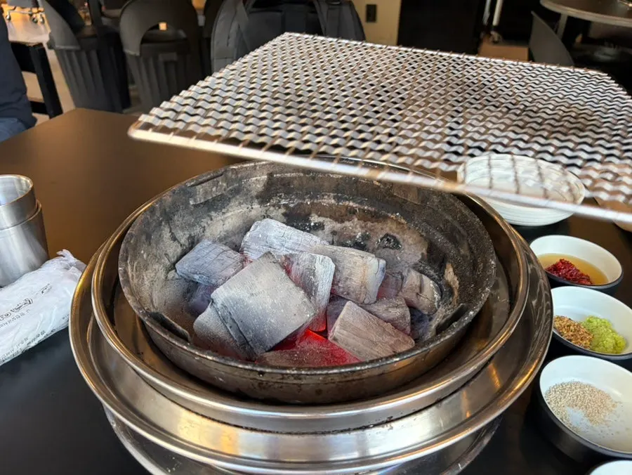 A charcoal grill placed on the table
