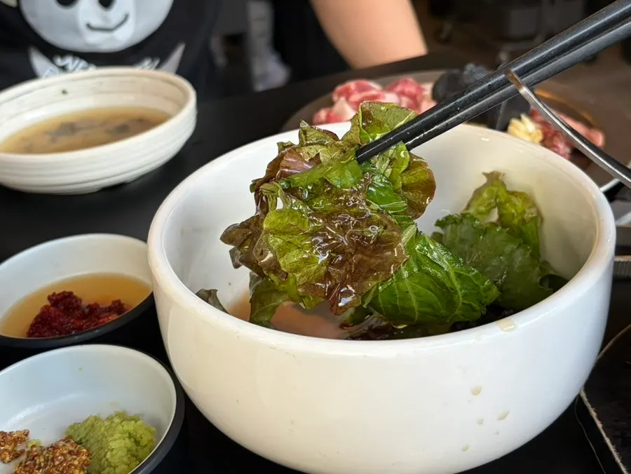 Fresh lettuce kimchi served on the side