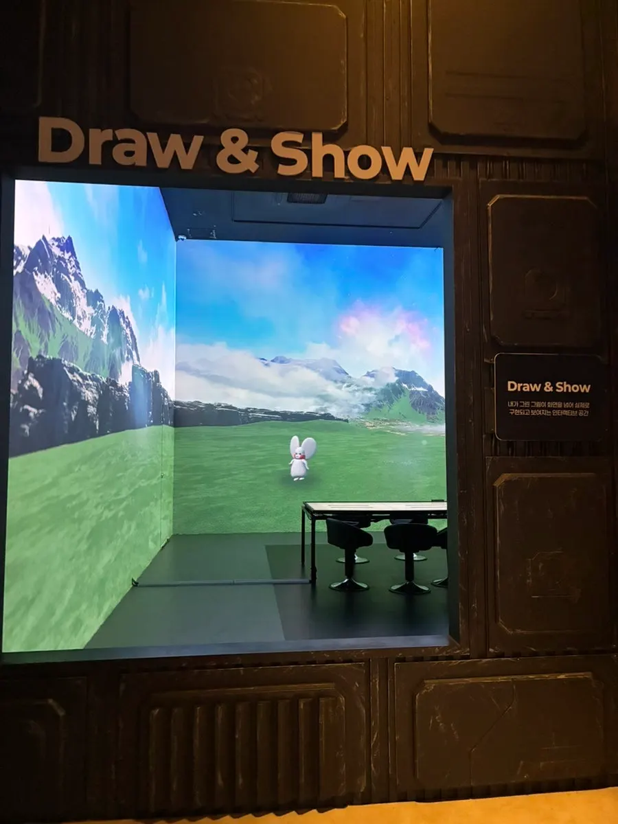 Giant claw machine and photo booth on the 3rd floor