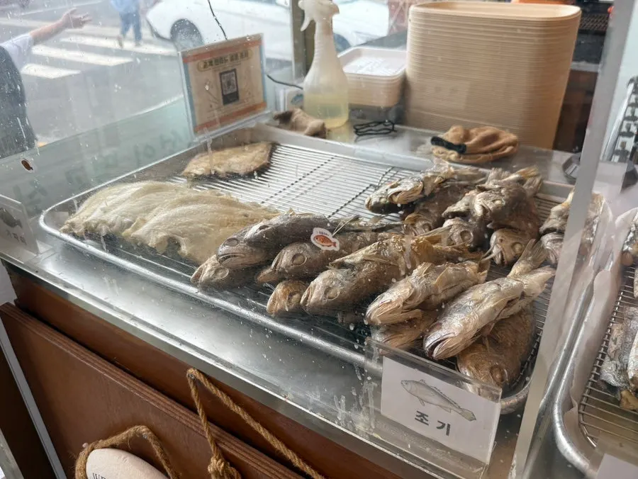Fish dishes placed at the counter