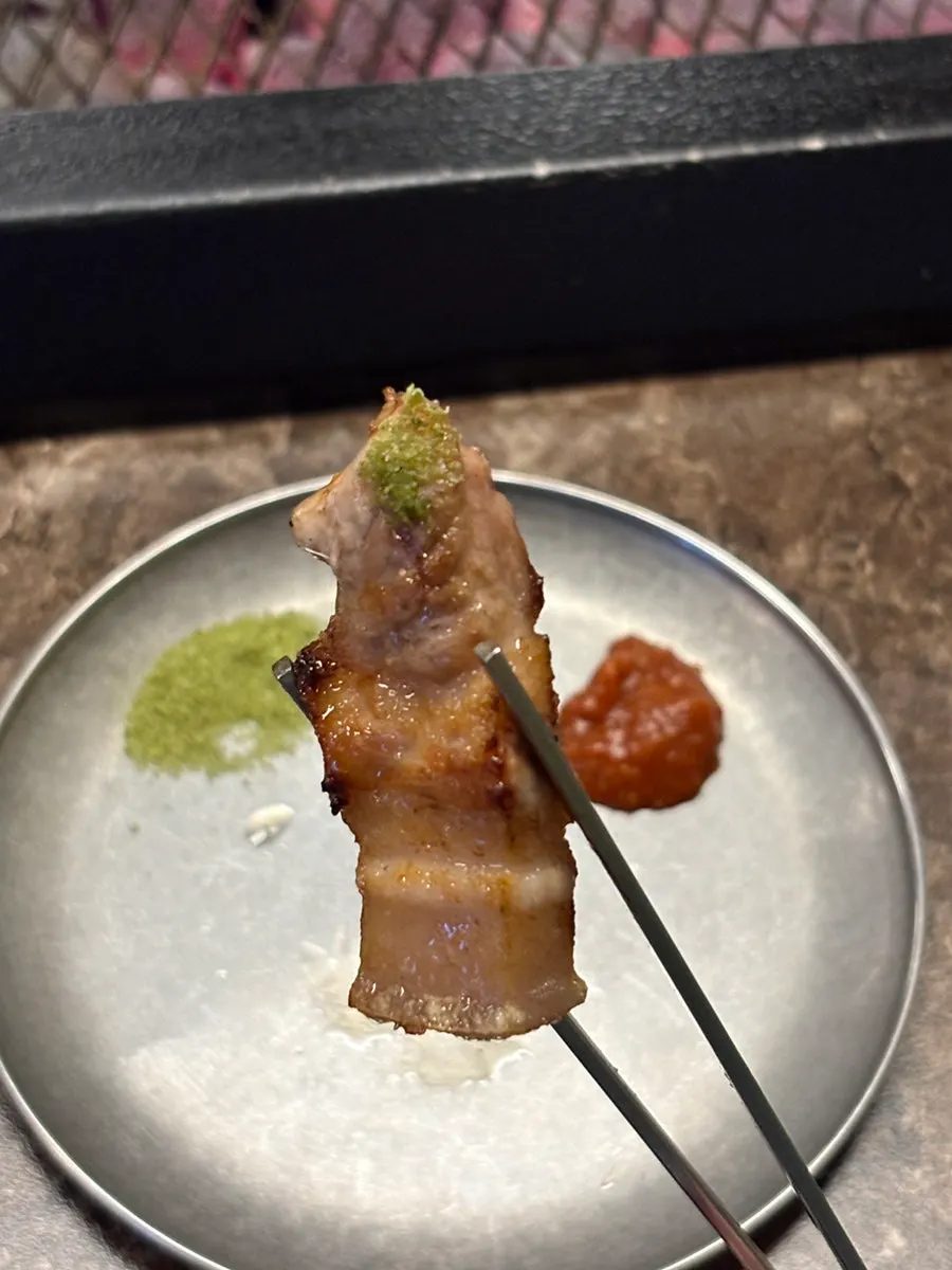 Black pork served with matcha salt