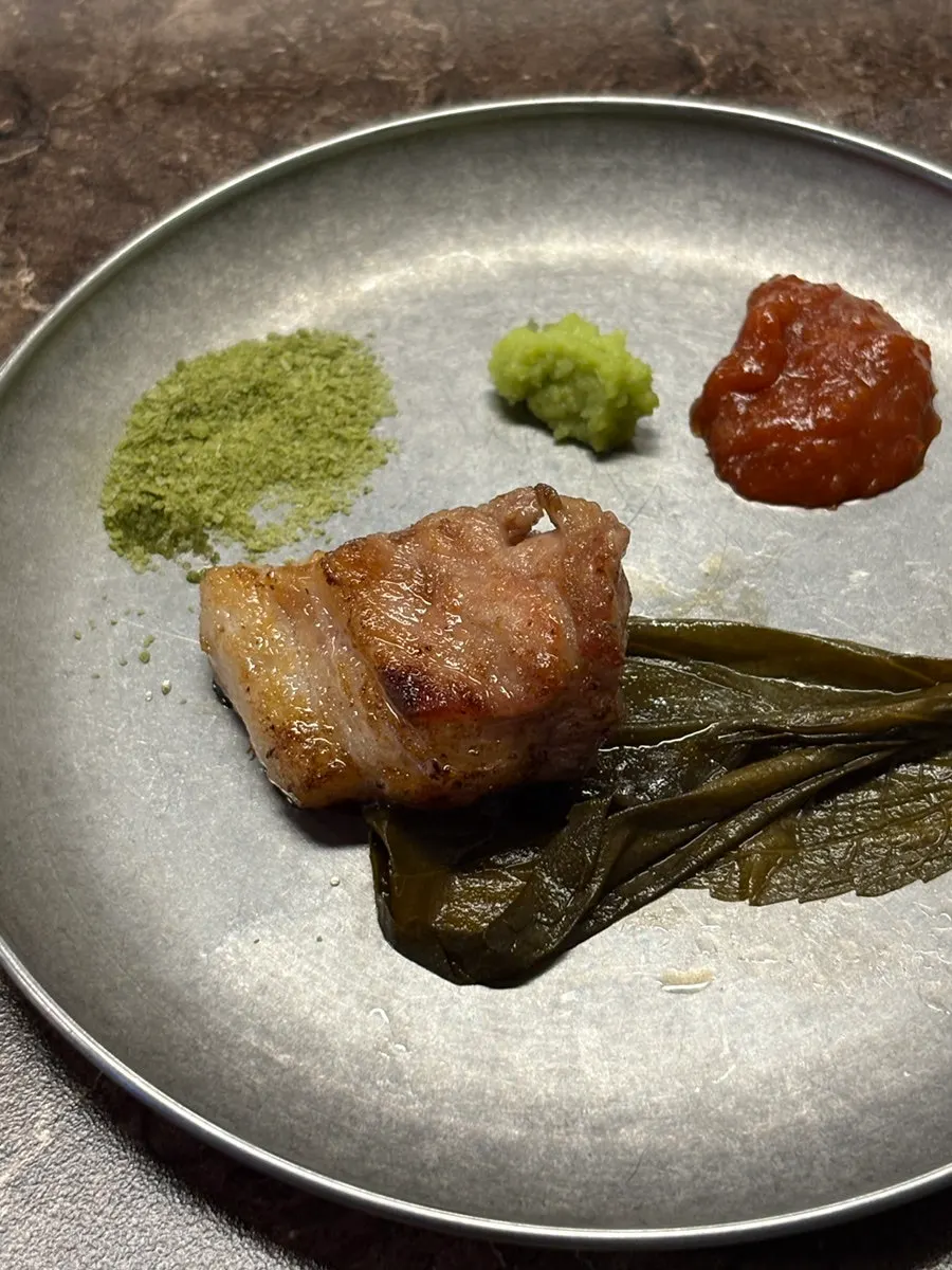 Black pork eaten with mel stew
