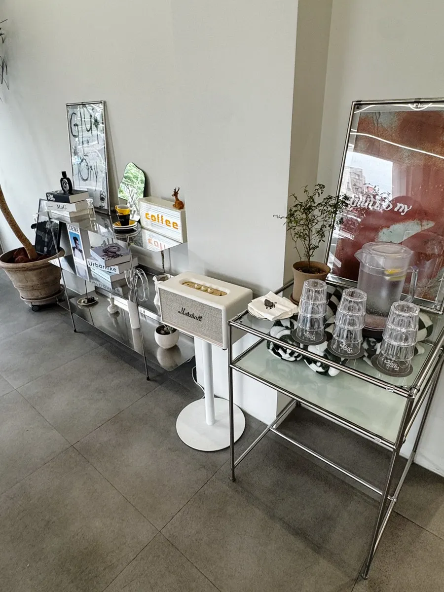 Gluttony Coffee interior with full-height windows