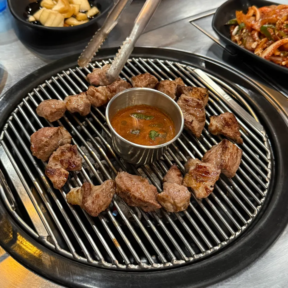 A tender piece of grilled white pork neck