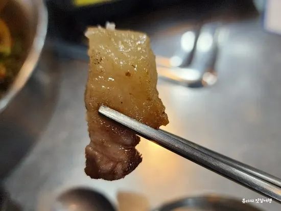 Black pork neck meat grilled to a perfect eating point