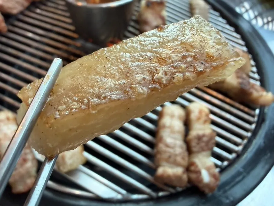 Close-up of grilled black pork belly