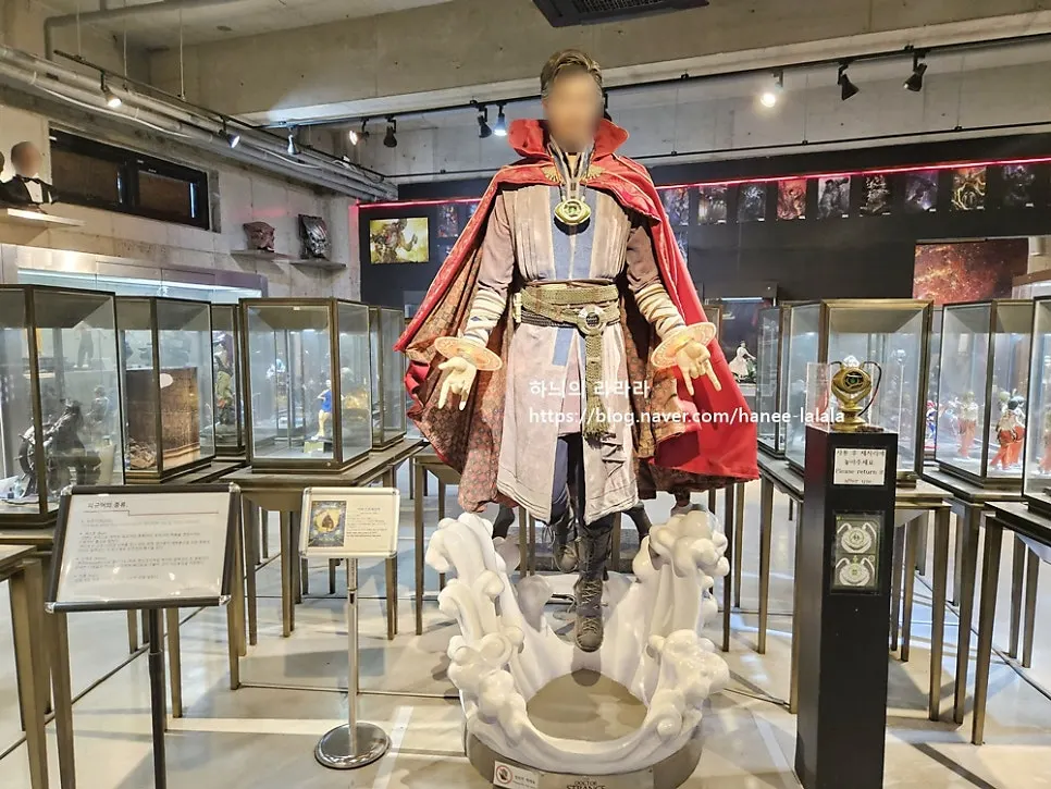 Entrance lined with a variety of character figures