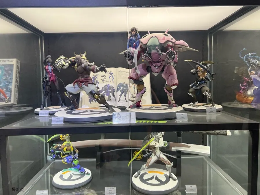 Display case of anime character figures