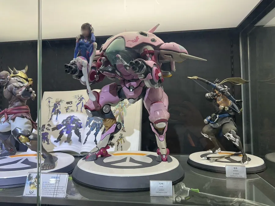 Demon Slayer character figures on display