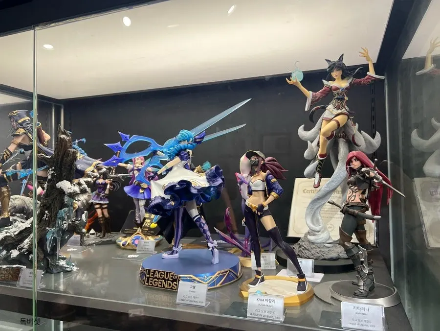 Display shelf filled with anime figures