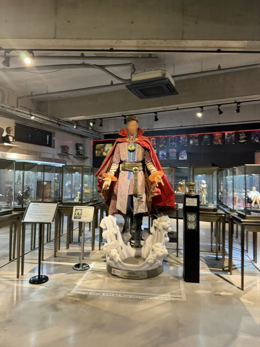 Exhibit entrance after putting on the admission wristband