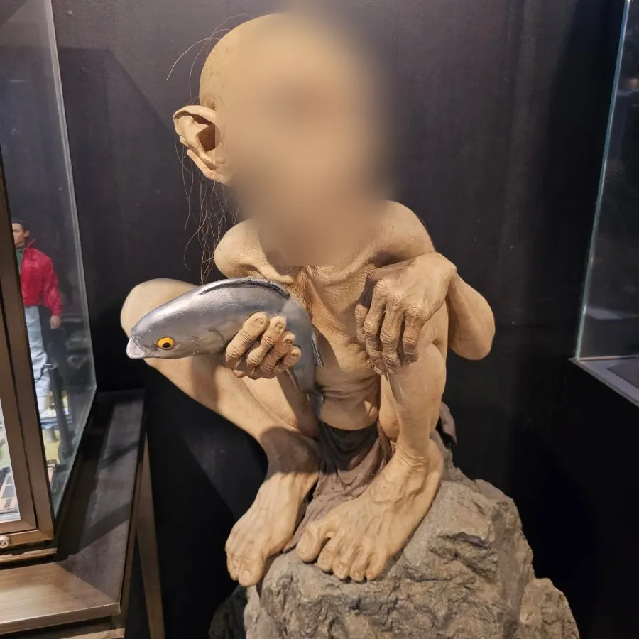 Exhibits lit up under gallery lighting at Figure Museum Jeju