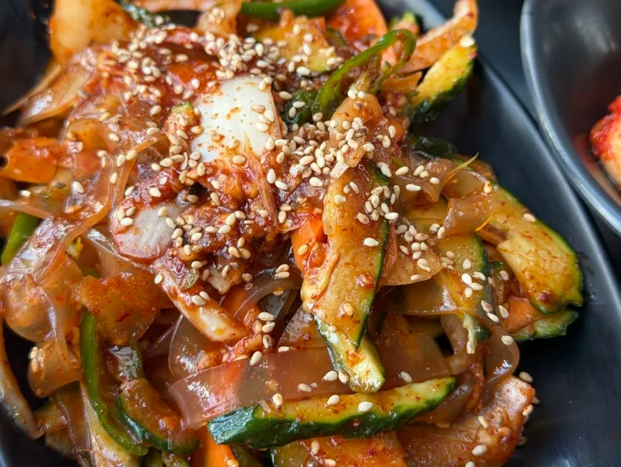Spicy side dish of Chinese glass noodles mixed with cucumber