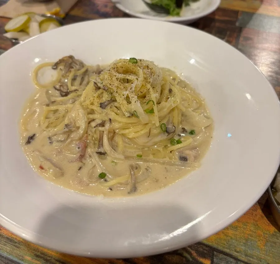 A plate of Cultured's mushroom cream pasta