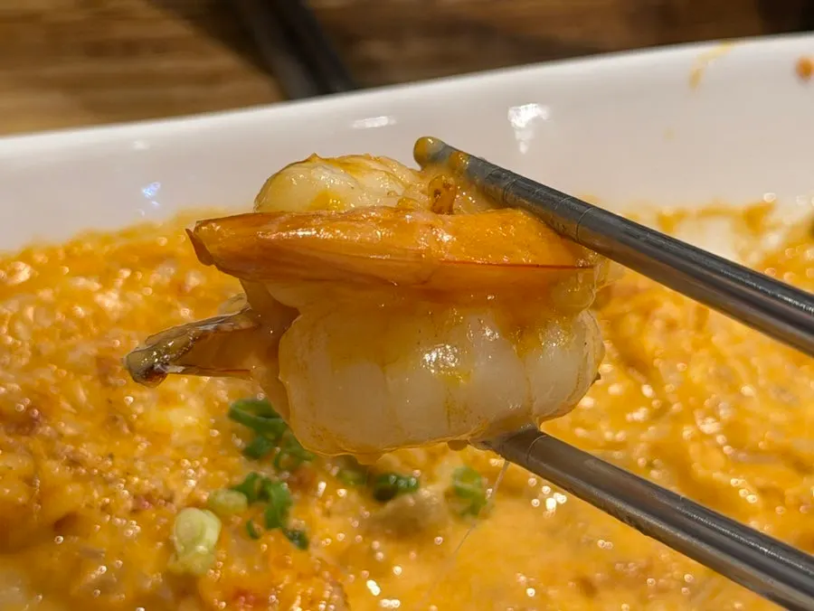 Risotto topped with king prawns