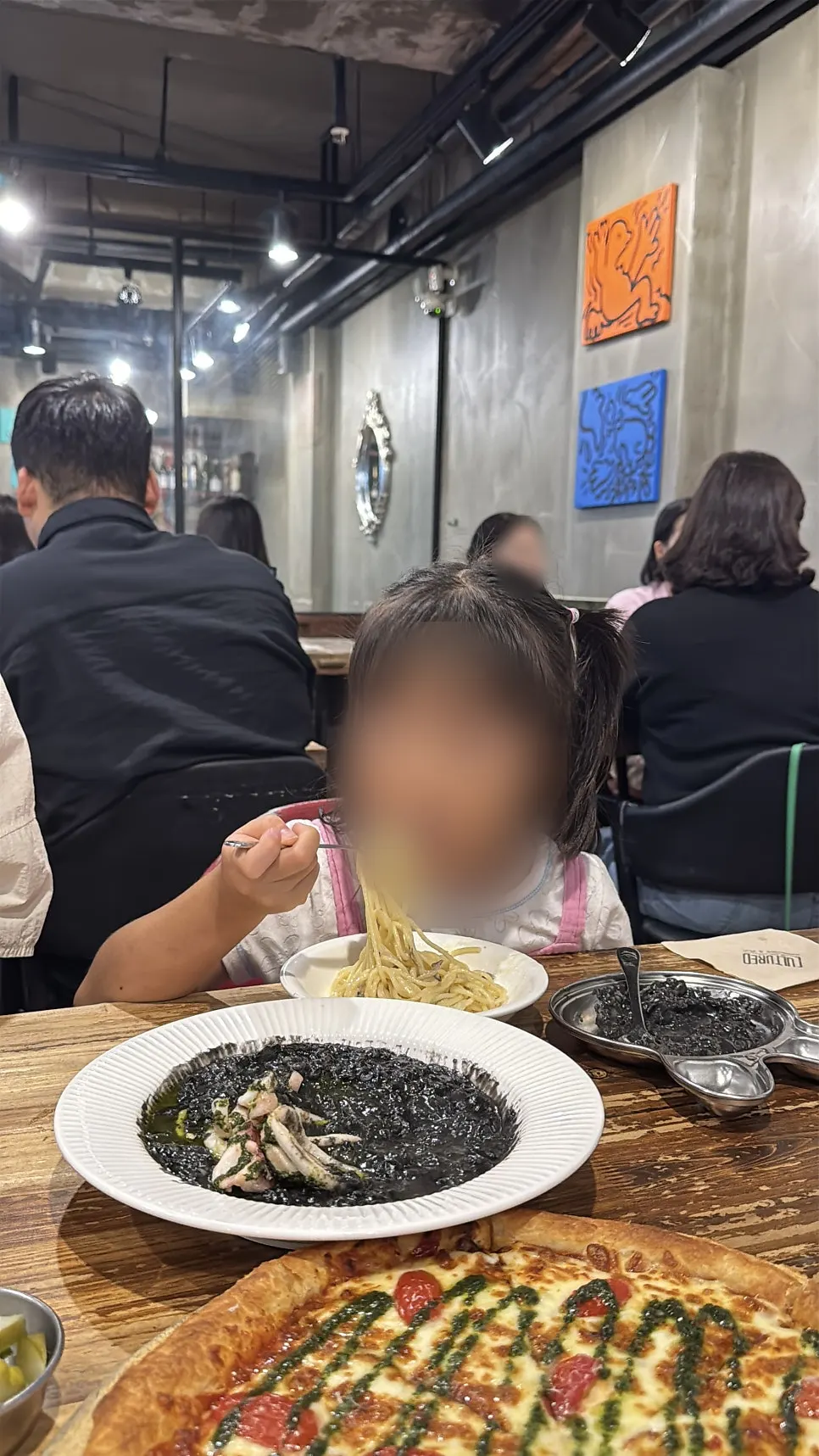 A child eating pasta