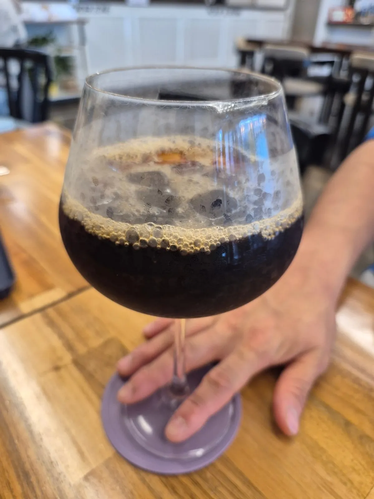 Drip coffee served in a wine glass at Gasangsun Coffee