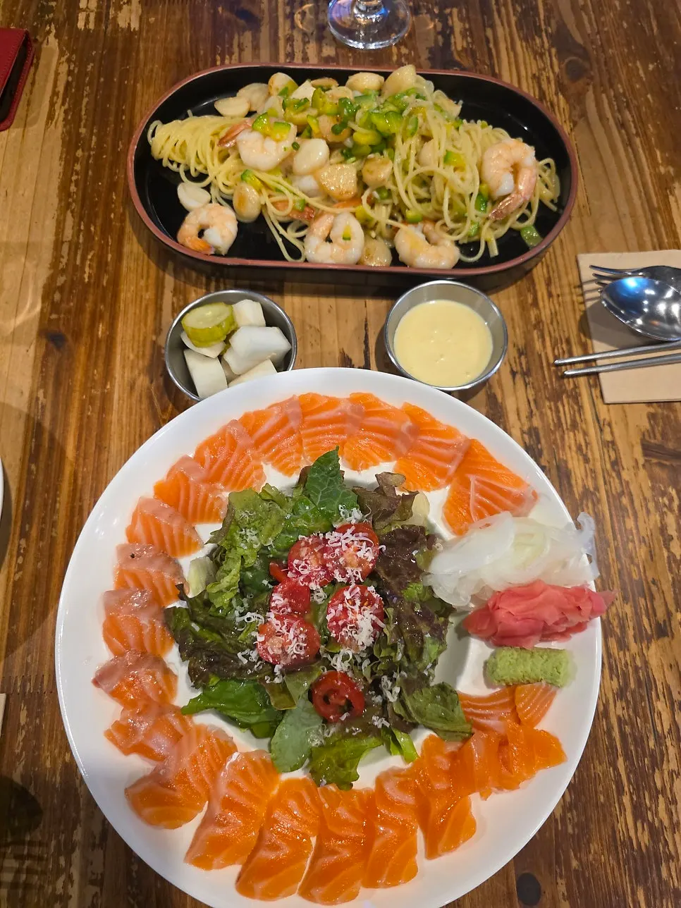 Close-up of the plump shrimp on the oil pasta
