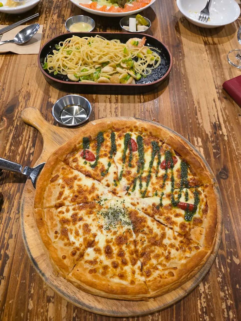Full view of the pizza split into two flavors