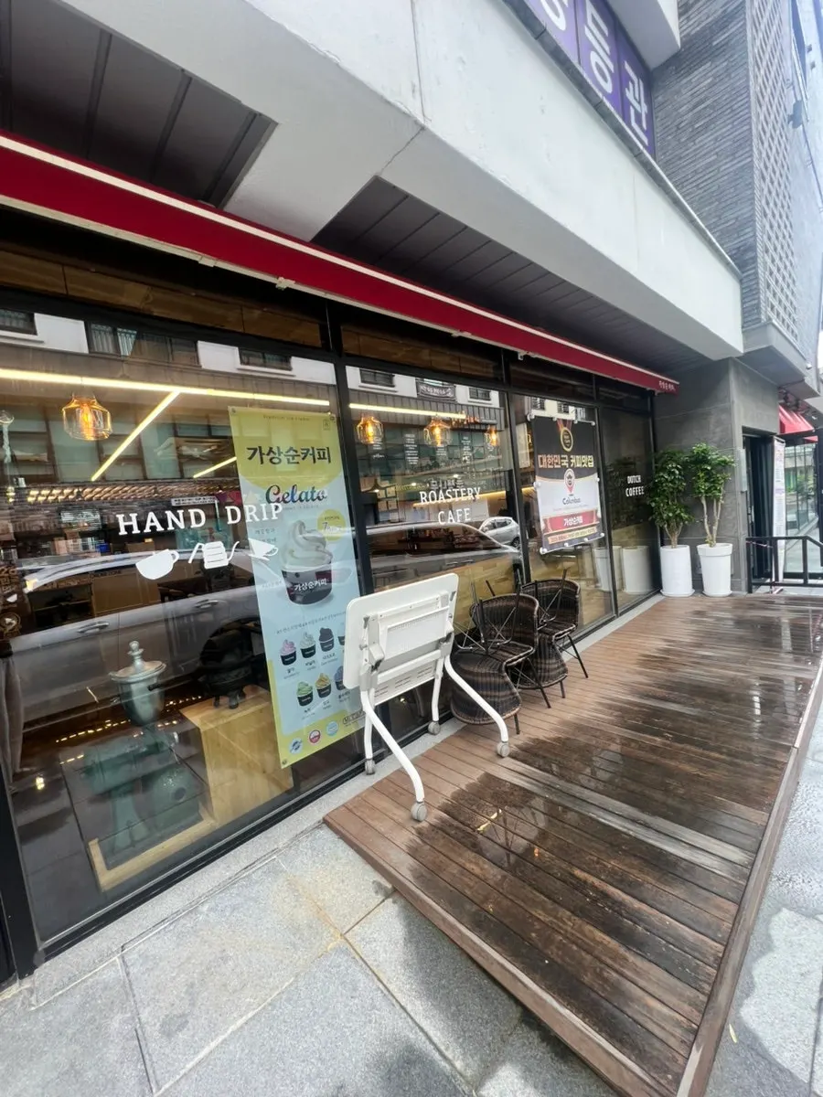 Outdoor tables folded up after the rain