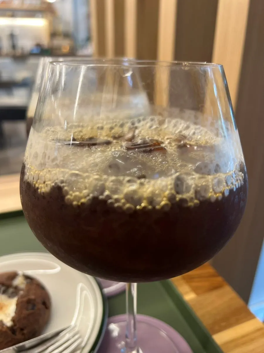 Wine glass of dutch coffee on the table