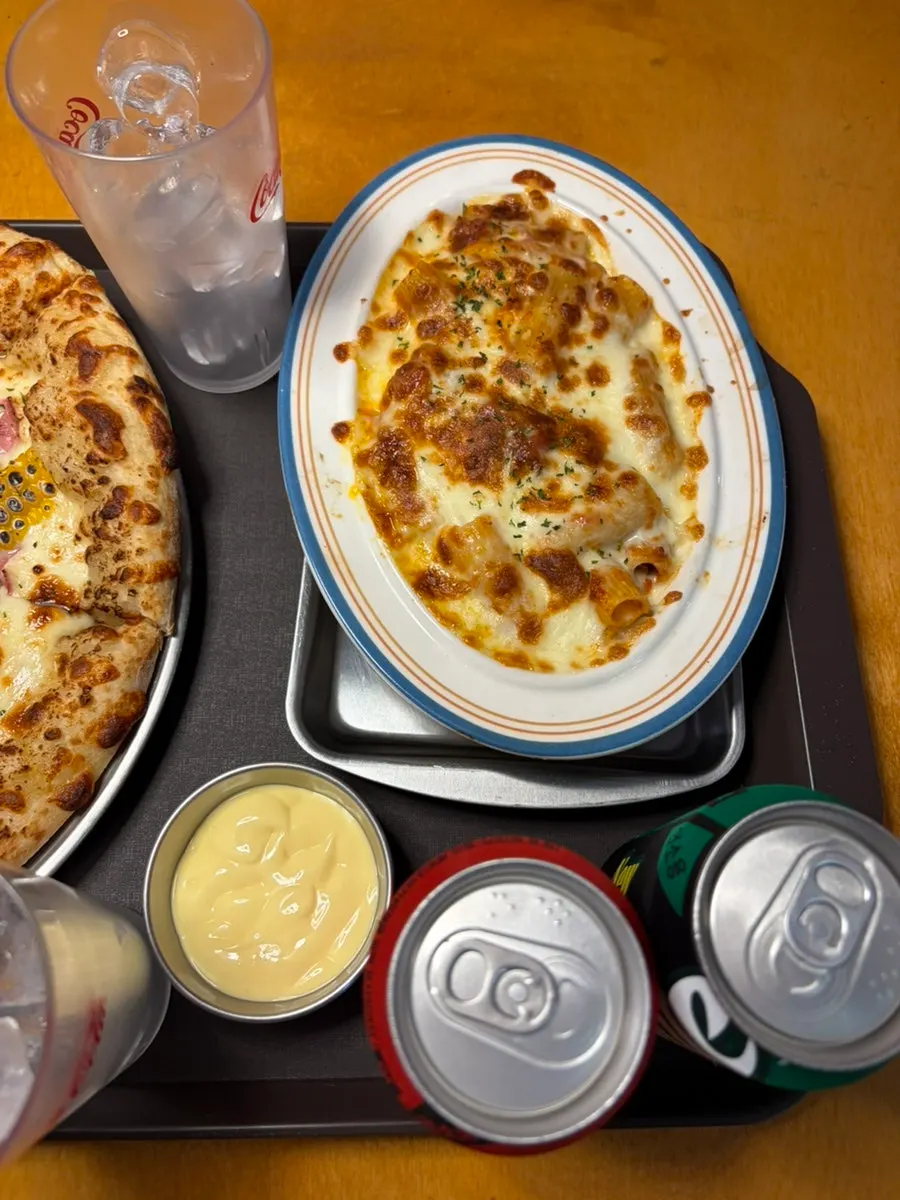 Table set with pizza and sides