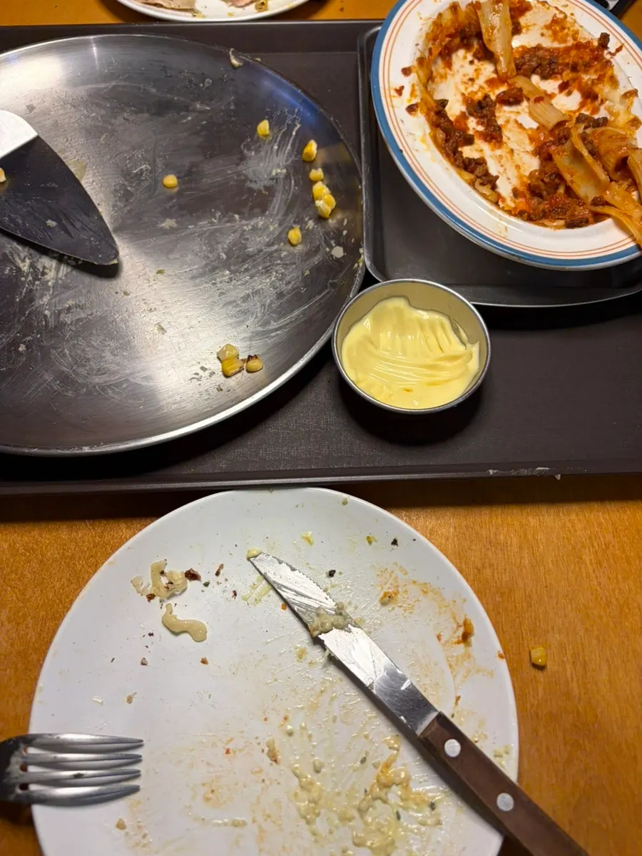 Pizza meal with fizzy drinks