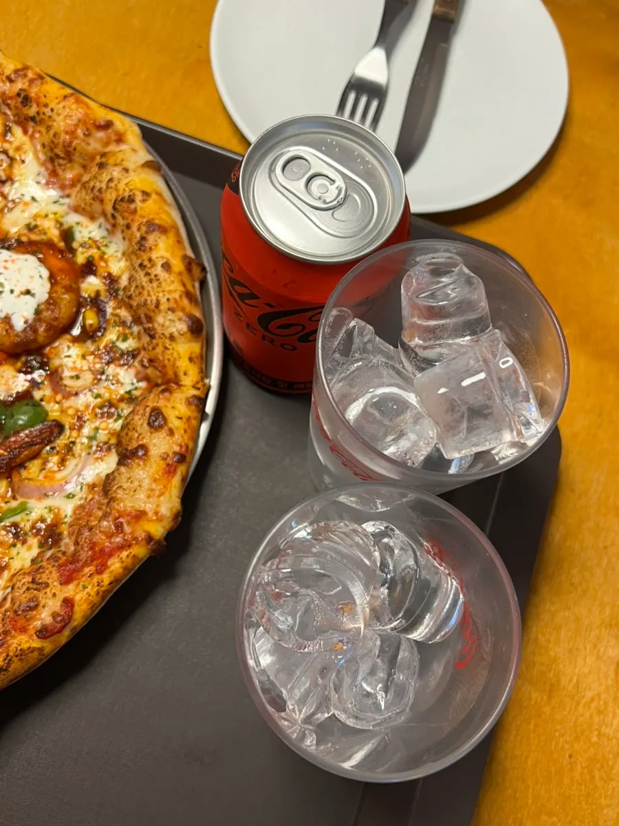 Wood-fired pizza topped with shrimp