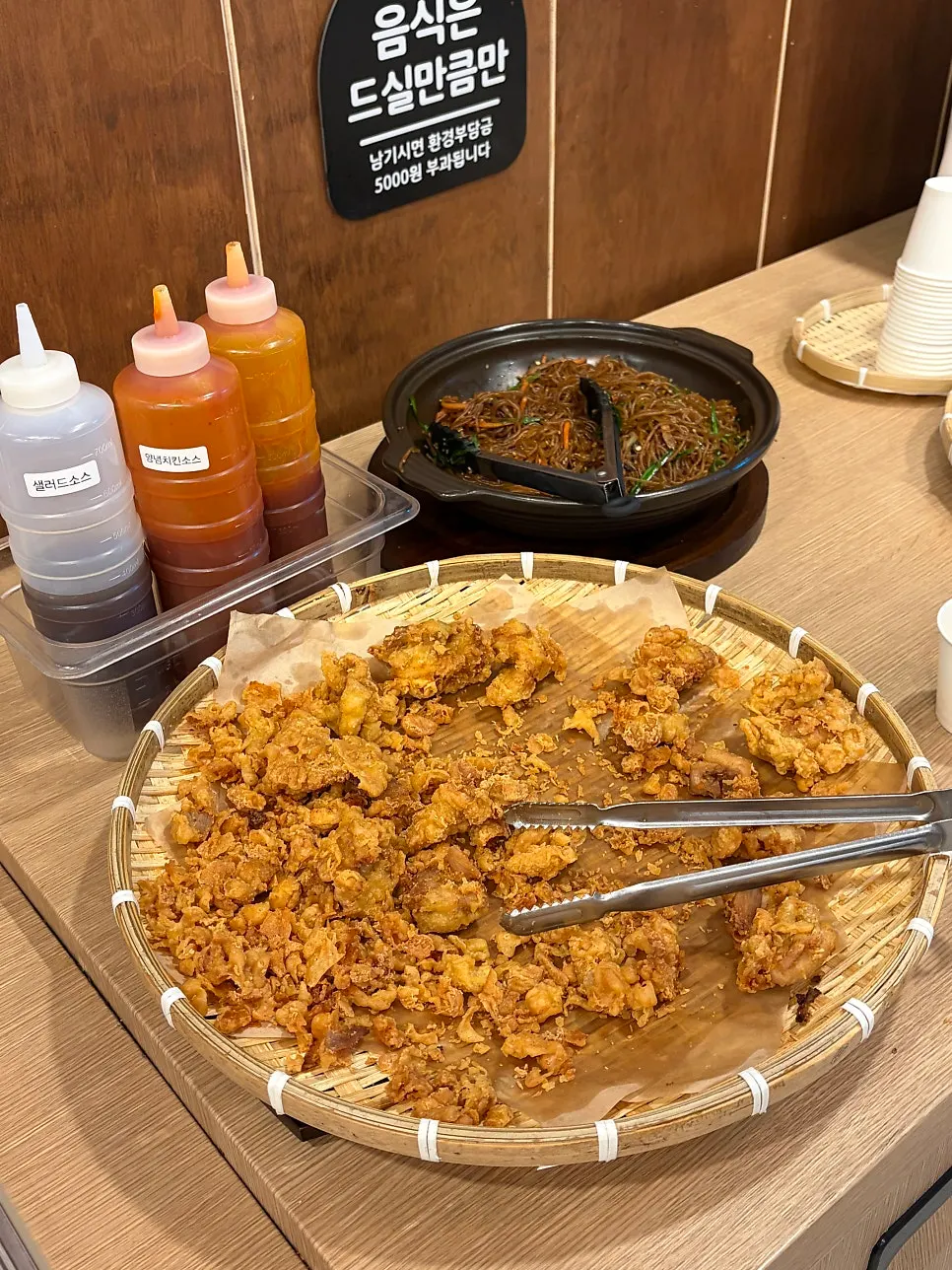Side dishes at the salad bar being continually refilled