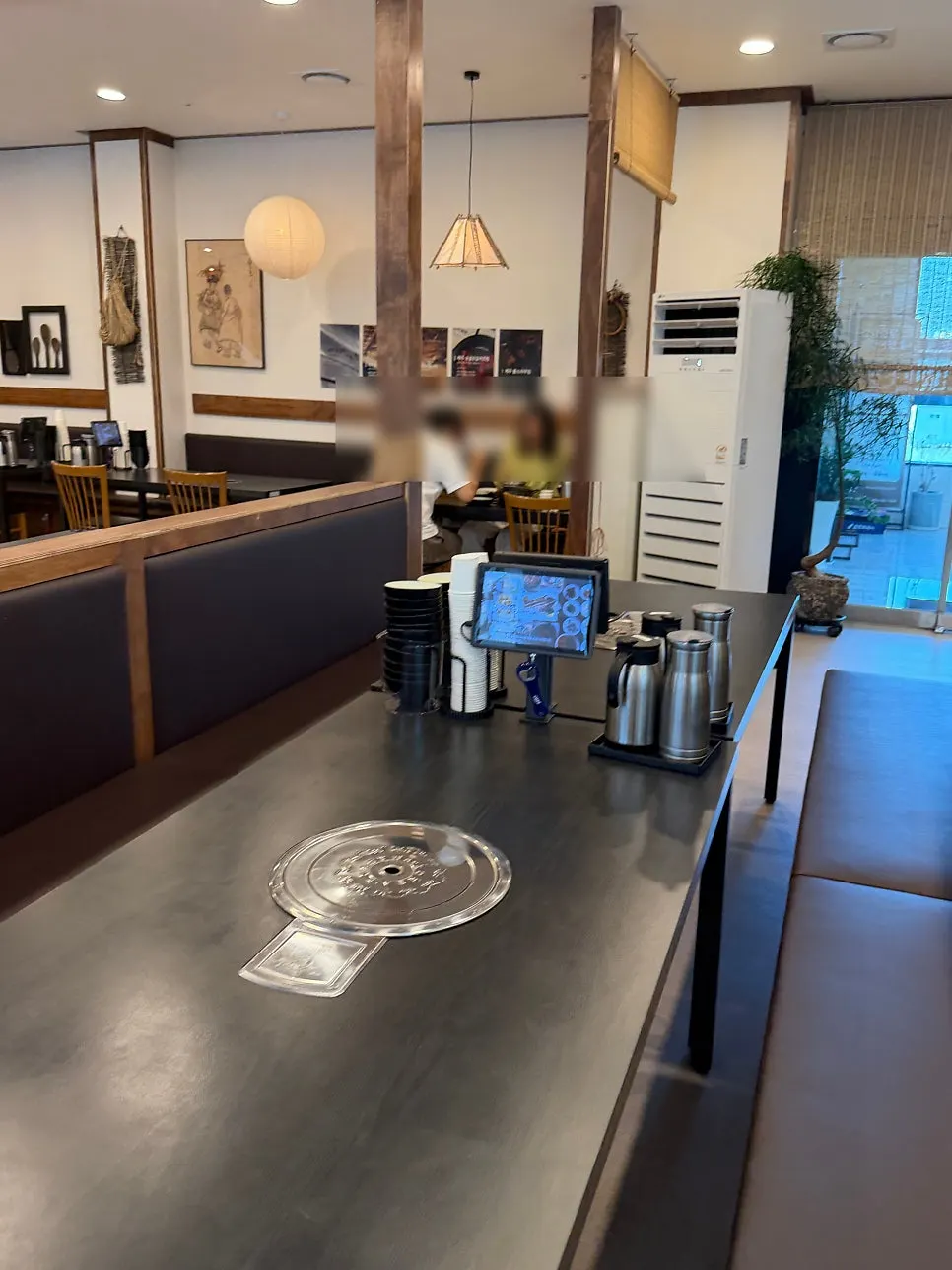 Wide table seating at Jeju Badang