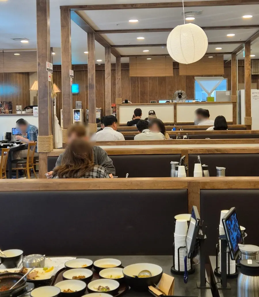 Interior of Jeju Badang decorated with wood and Jeju stone