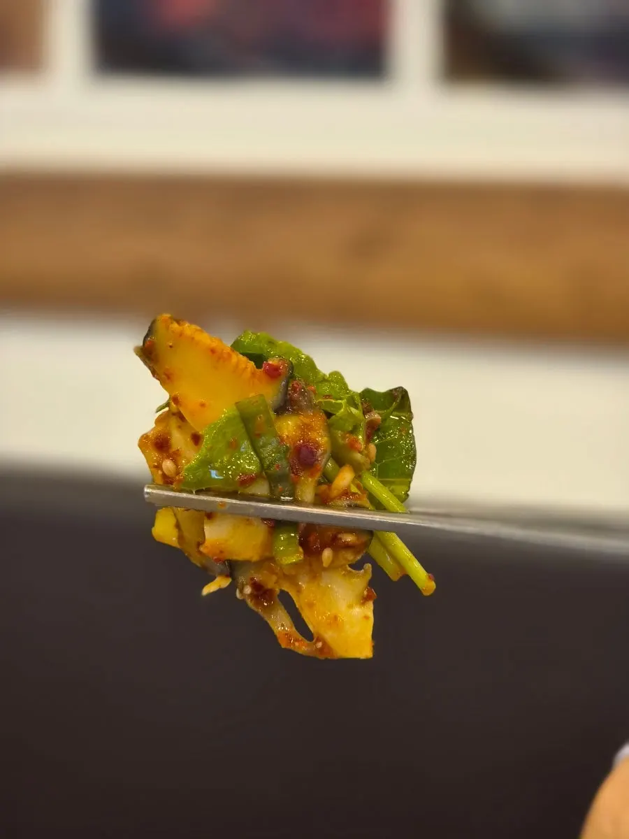 Close-up of the chewy whelk salad