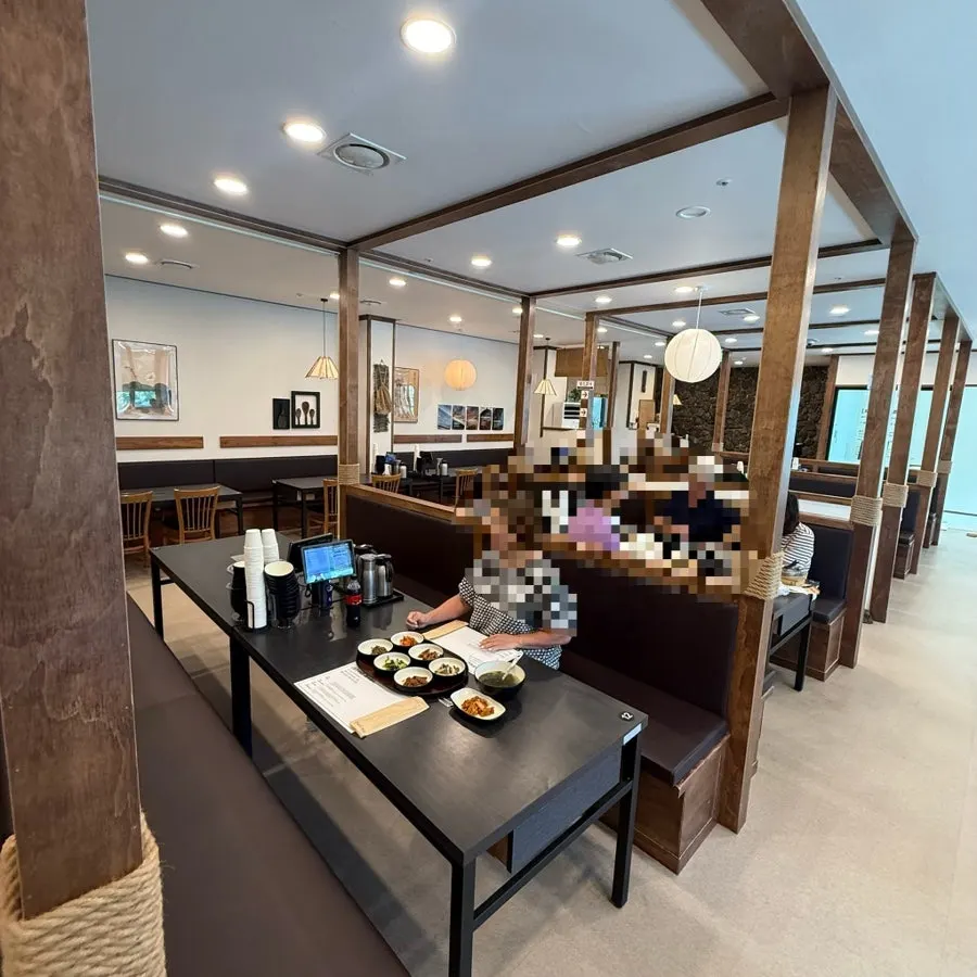 Interior of Jeju Badang with wood-tone decor