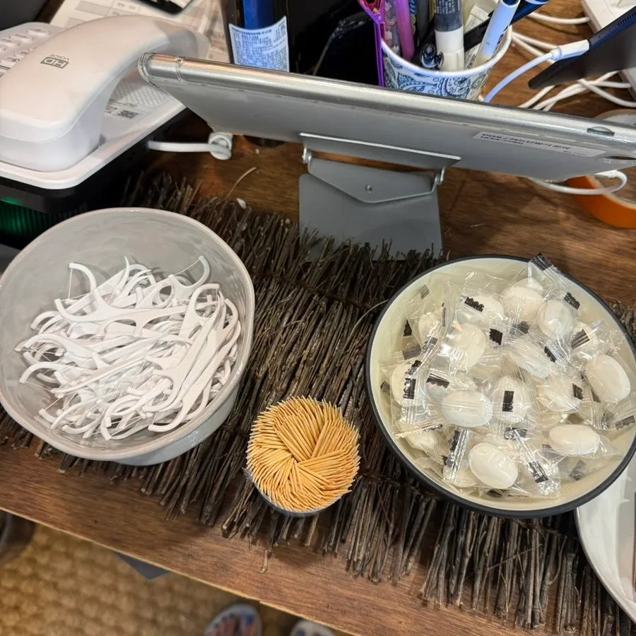 Toothpicks, interdental brushes, and individually wrapped mint candies