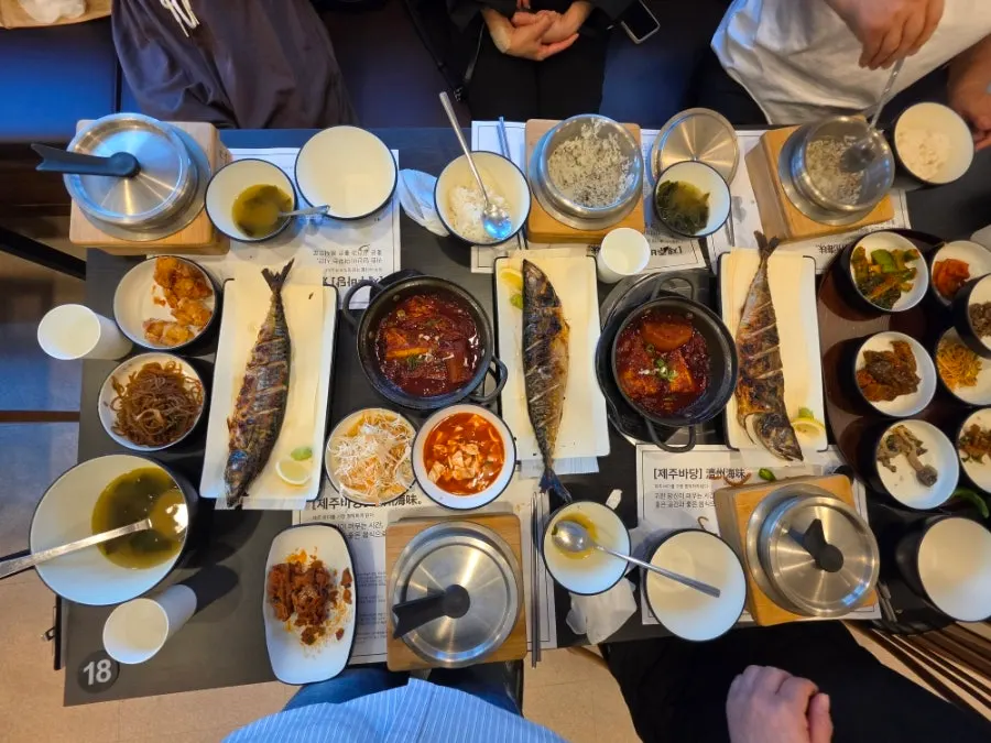 Full spread of grilled mackerel rice set and pot rice