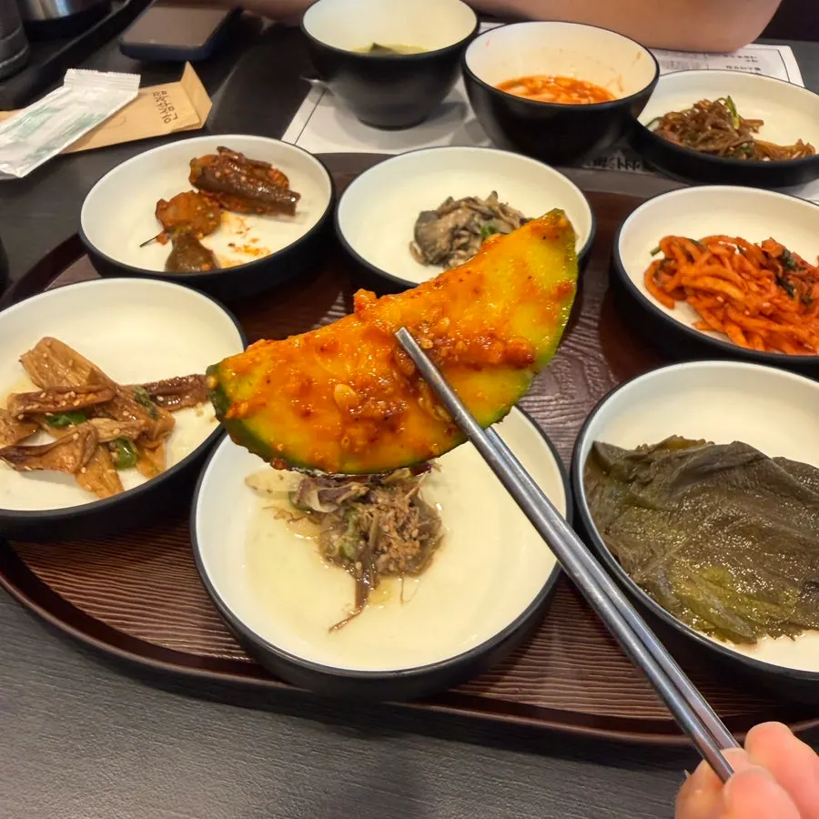 Self-serve bar food set alongside the basic side dishes