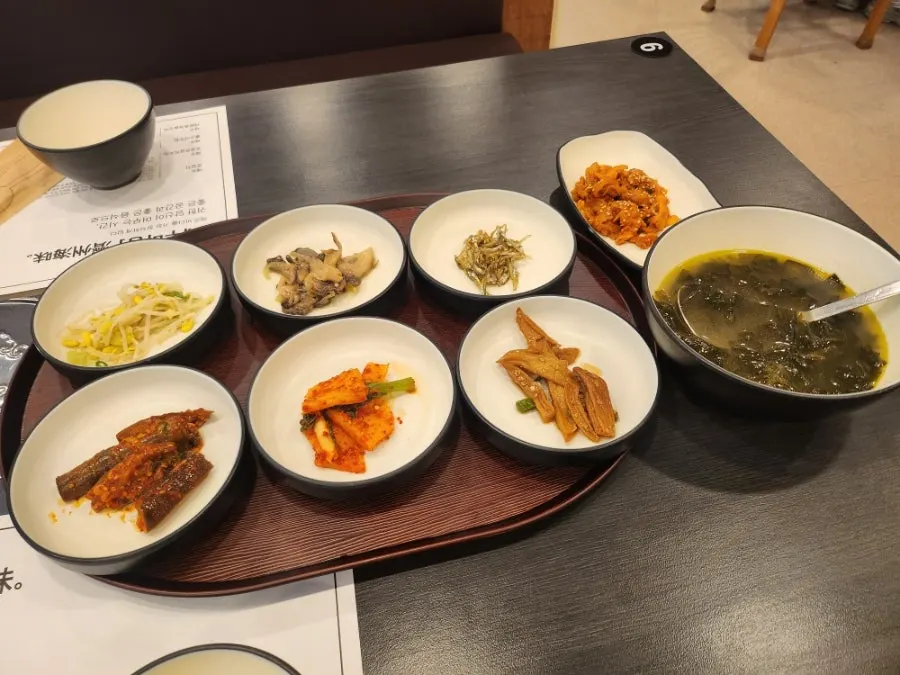 Basic side dishes including seaweed soup and seasoned greens