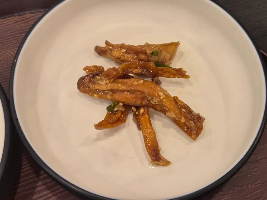 Close-up of moist grilled mackerel flesh