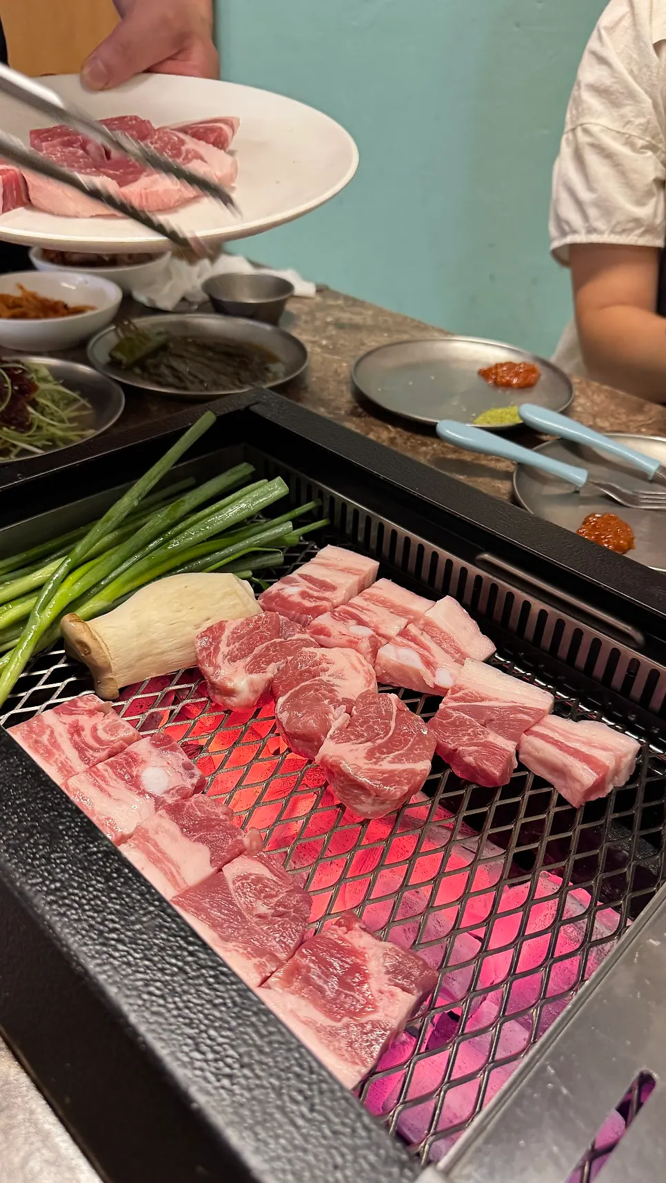 A glossy plate of raw Nanchuk Matdon meat
