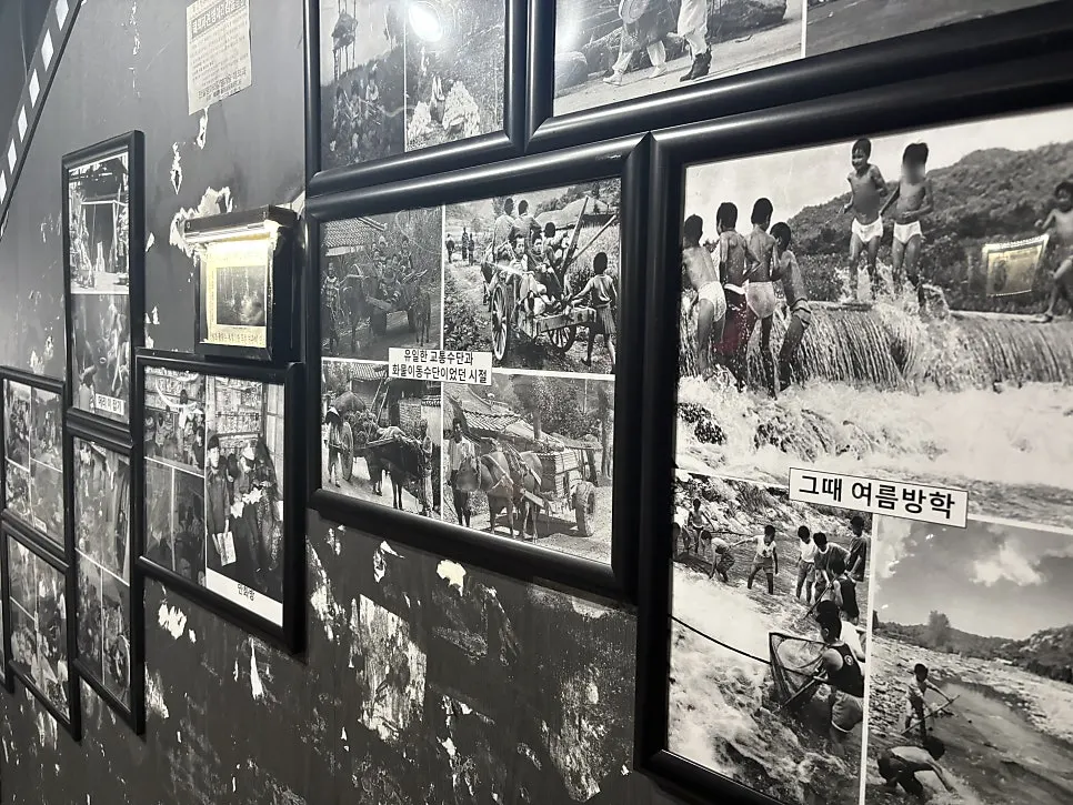 Black-and-white toned space at the start of the exhibition