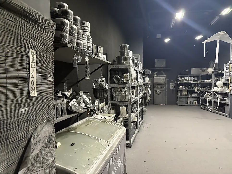 Black-and-white exhibition space during the preshow