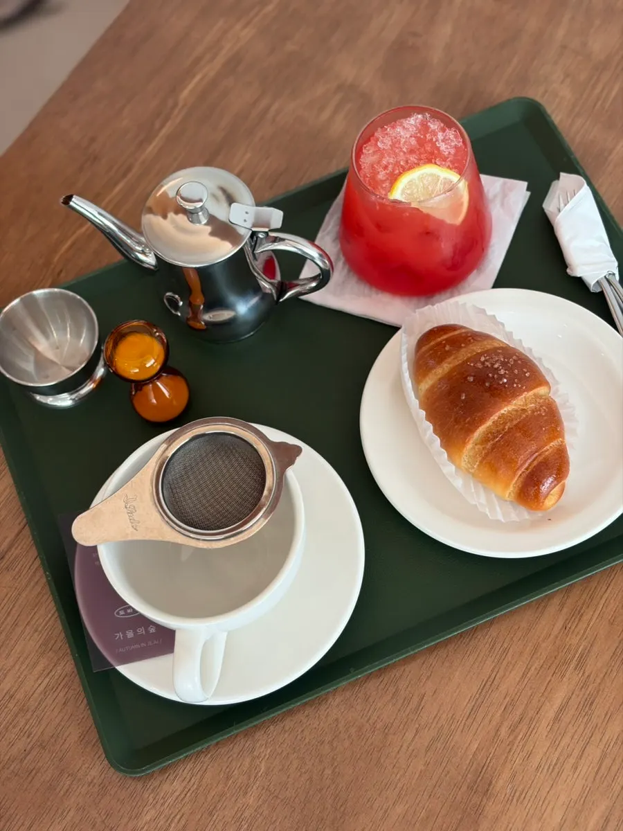 Neatly plated tea and bakery items