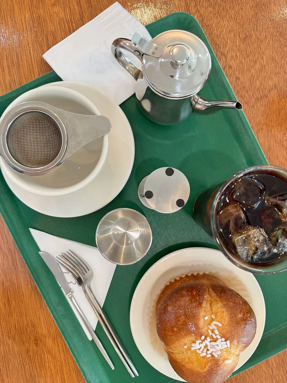 Teacups and tea ware displayed at Dobana