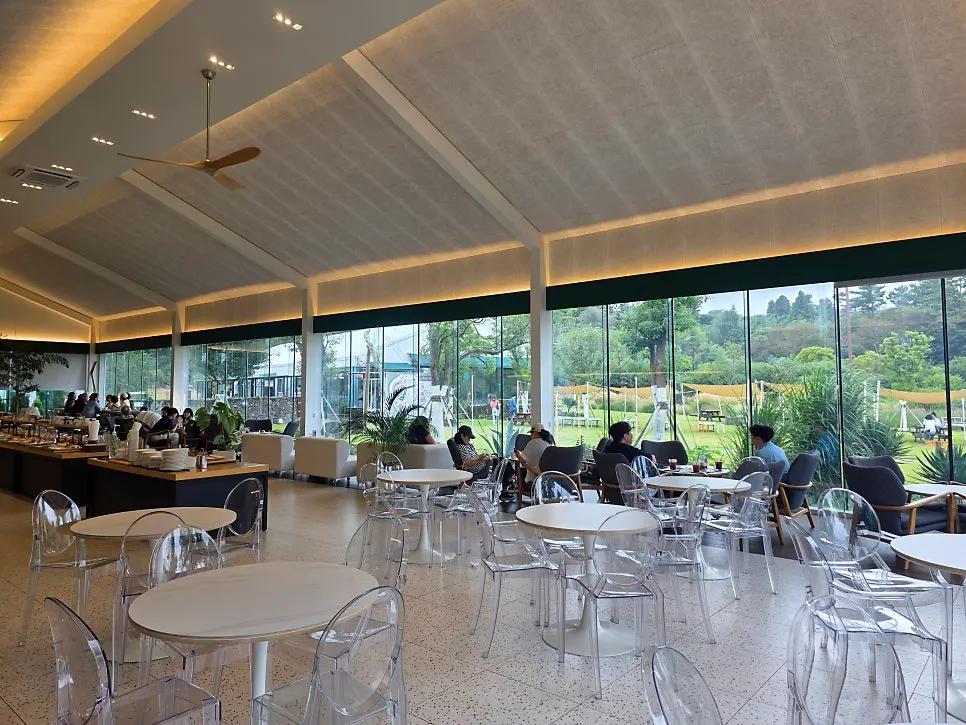 View toward the café interior with garden scenery
