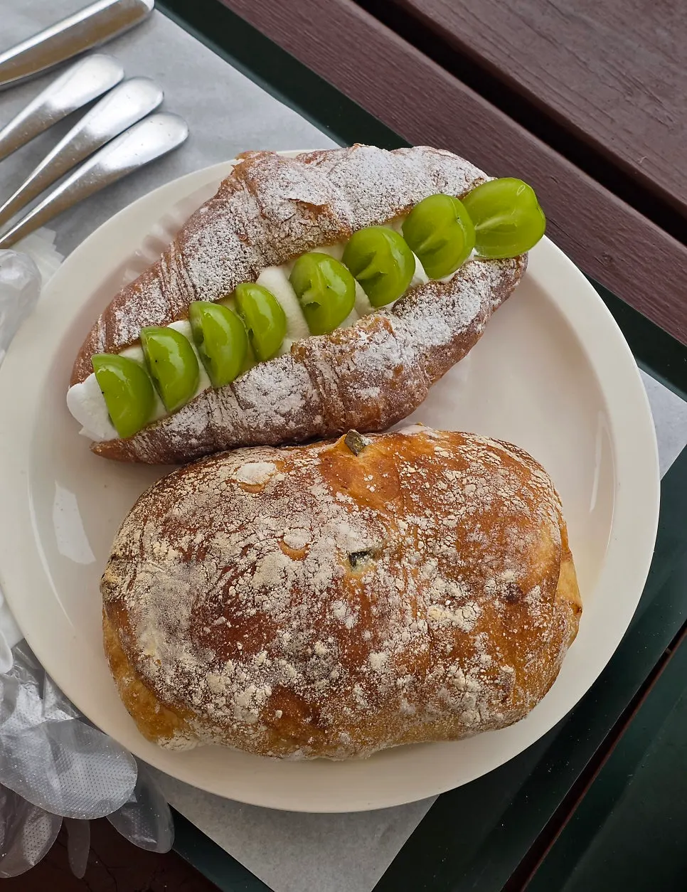 Drinks and bread on an outdoor table