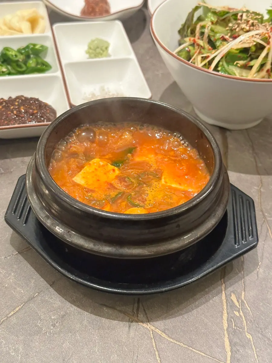 Free aged-kimchi stew served as a side