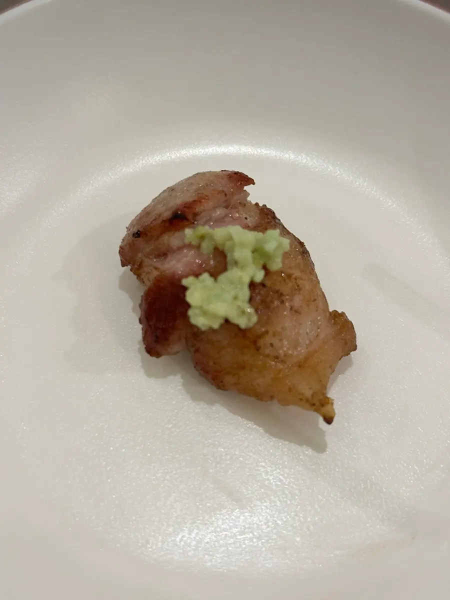 Black pork dipped in melljeot sauce
