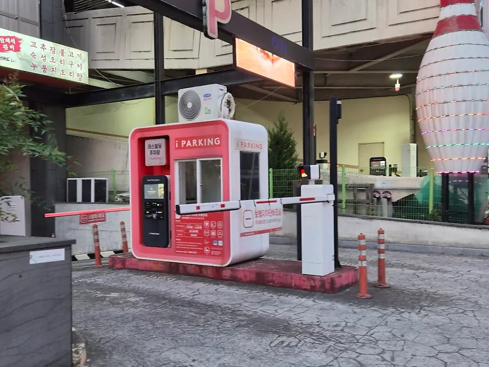 Entrance and parking space in the building's basement lot