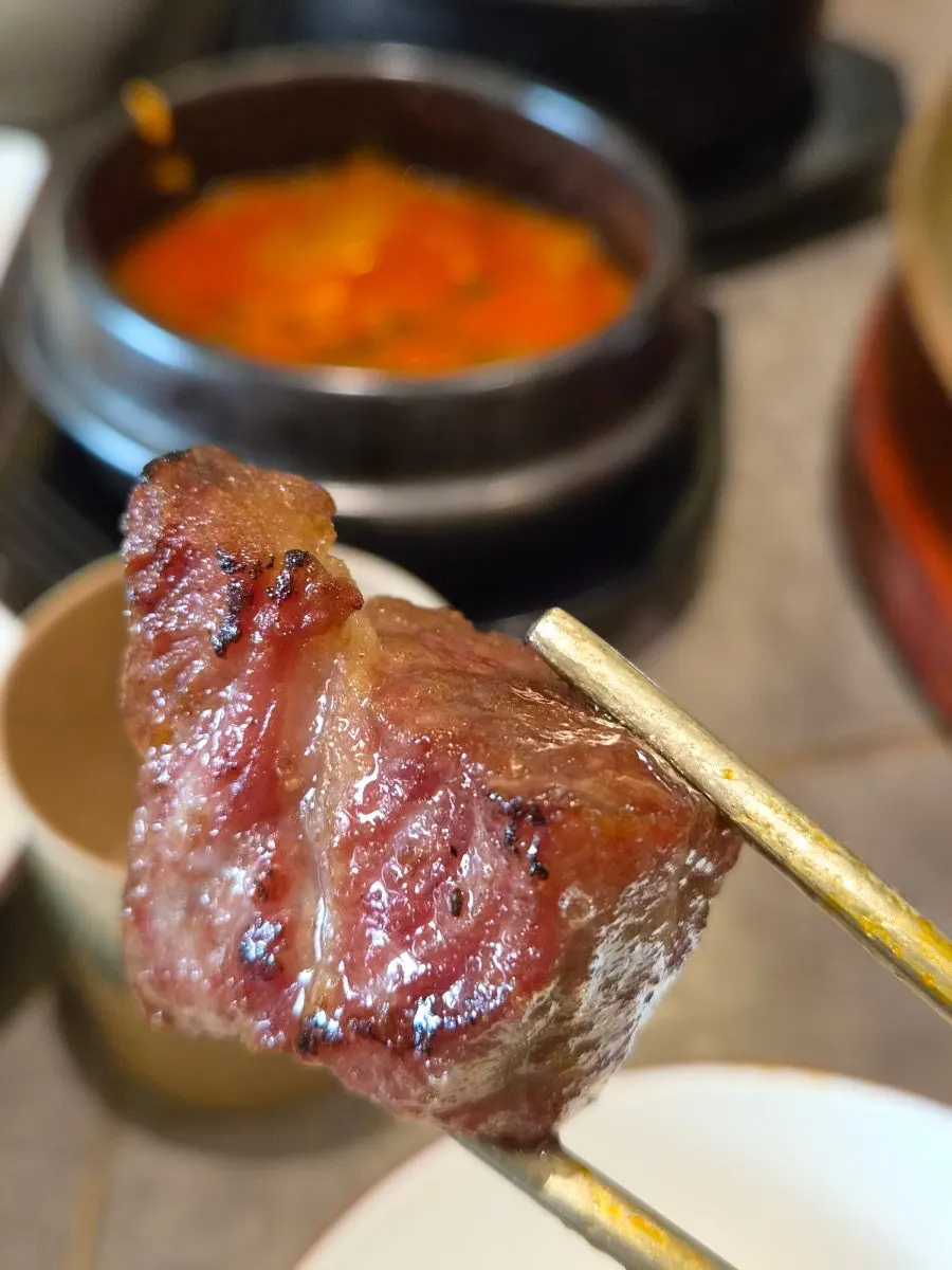 Mild pork neck grilled by staff